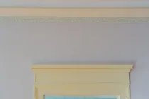 Detail wall painting & upper door frame