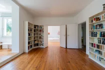 View of the upper floor plus two bedrooms & home office desk with view of the garden