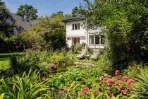 Garden landscape with natural pond & high level of privacy