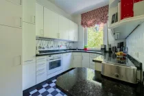 Kitchen plus built-in cupboards and appliances