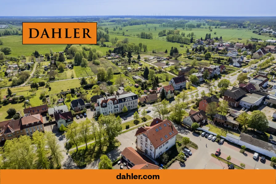 Titelbild - Wohnung kaufen in Beelitz - Sanierte 4-Zimmer-Maisonettewohnung mit Weitblick in die grüne Umgebung - optional mit Balkon