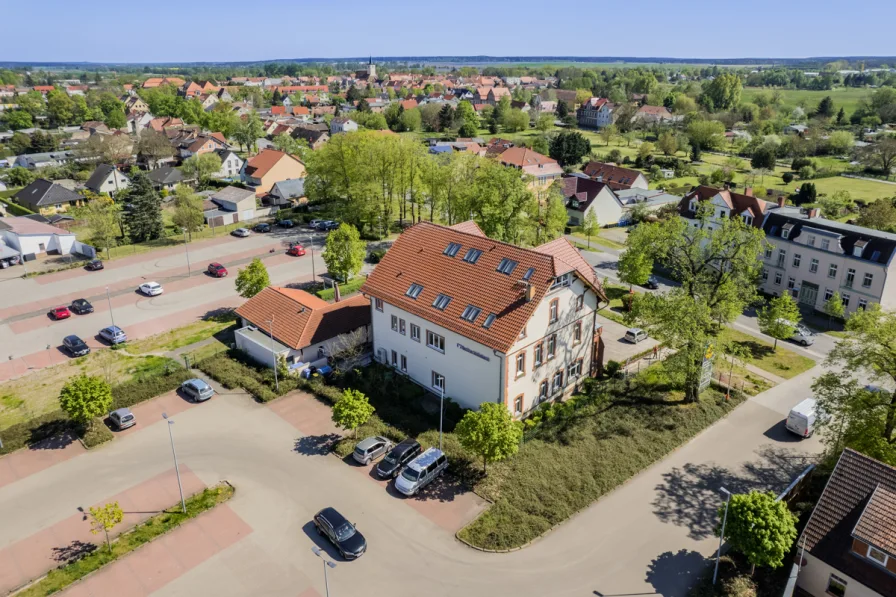 Aerial view of the property and the surrounding area