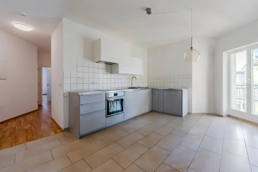 Kitchen with built-in furniture and appliances