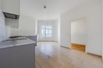 Kitchen with adjoining balcony