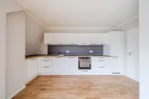 Open-plan fitted kitchen