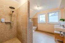 Full bathroom with bathtub and shower