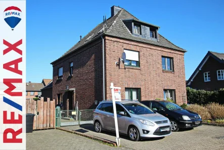  - Haus kaufen in Issum - REMAX - Doppelhaushälfte plus Einliegerwohnung, Garage und Garten in Issum