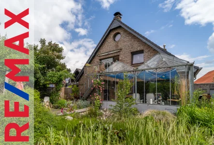 Titelbild_Wissel - Haus kaufen in Kalkar - Viel Platz für große Familien: Mehrgenerationenhaus mit gepflegtem Garten in ruhiger Lage von Wissel