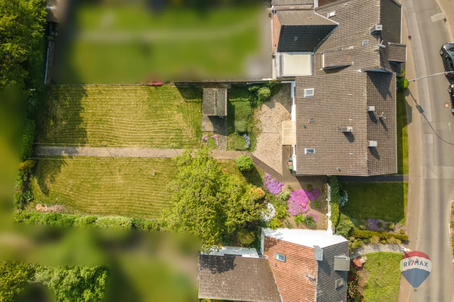 Vogelperspektive  - Haus kaufen in Kevelaer-Kervenheim - Charmantes Einfamilienhaus auf großem Grundstück im Herzen von Kervenheim zu verkaufen