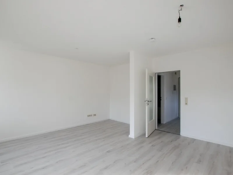Heller Wohn- und Schlafbereich - Wohnung kaufen in Rümmingen - Helle 1-Zimmer-Wohnung mit Schwimmbad & Balkon