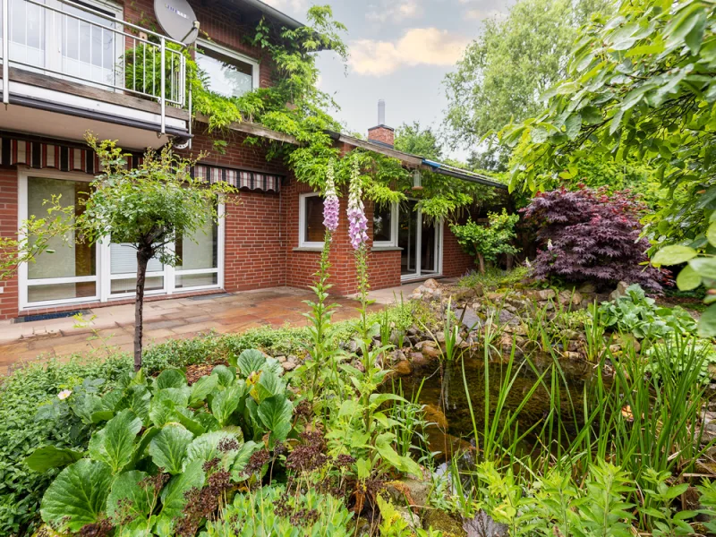 Ihre Gartenidylle - Haus kaufen in Diepholz - Gartenidylle trifft Innenstadt - Großzügiges Reihenendhaus mitten in Diepholz