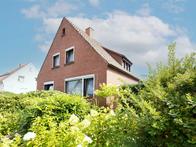 Straßenansicht - Haus kaufen in Bramsche - Ein Haus mit Charakter in Bramsche - Gestalten Sie Ihr persönliches Wohnparadies