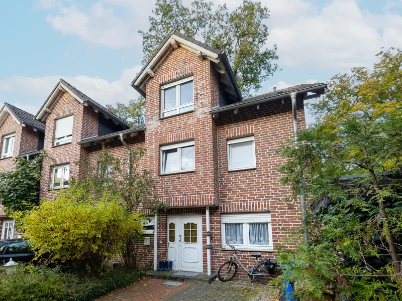 Ansicht - Haus kaufen in Lotte - Ihr Modernisierungsprojekt wartet auf Sie - Gestalten Sie Ihr Reihenendhaus in Lotte