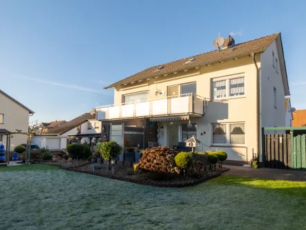 Ansicht Garten - Haus kaufen in Hagen am Teutoburger Wald - Gepflegtes Zweifamilienhaus in familienfreundlicher Lage in Hagen - Ihre Chance handeln Sie jetzt!