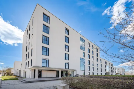 Außenansicht - Wohnung kaufen in München, Perlach - Moderne und ruhig gelegene 4-Zimmer-Wohnung mit sonnigem Balkon