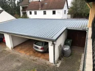 Carport und Holzschuppen