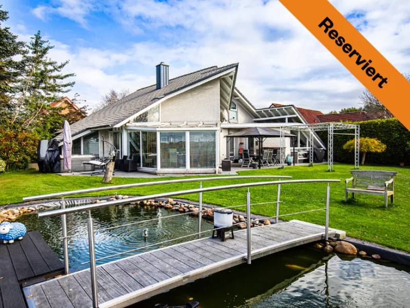 Dahler Ostfriesland - Haus kaufen in Rhauderfehn - Architektenhaus in Sackgassenlage mit unverbautem Blick über die Felder