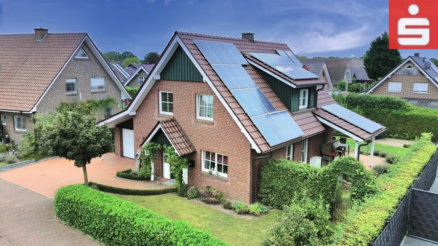 Straßenansicht - Haus kaufen in Neuenhaus - Wunderschönes Einfamilienhaus in ruhiger Siedlung von Veldhausen