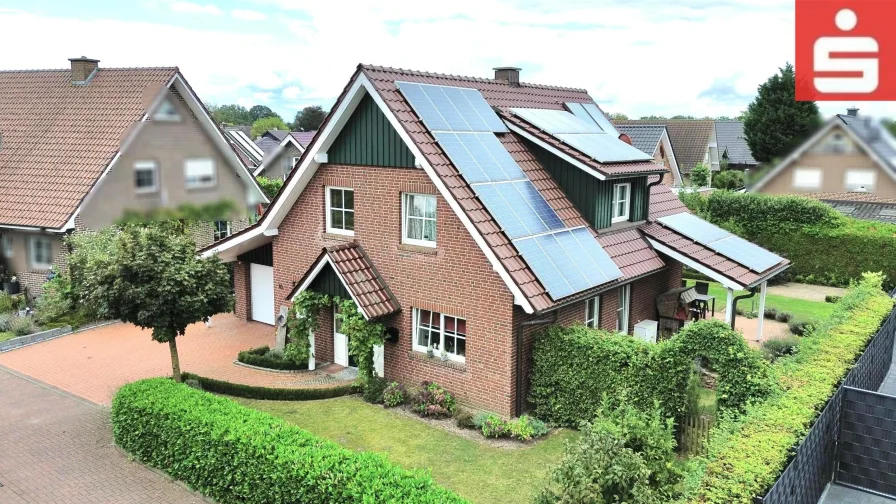 Straßenansicht - Haus kaufen in Neuenhaus - Wunderschönes Einfamilienhaus in ruhiger Siedlung von Veldhausen