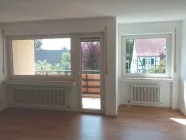 Wohnzimmer mit Balkon