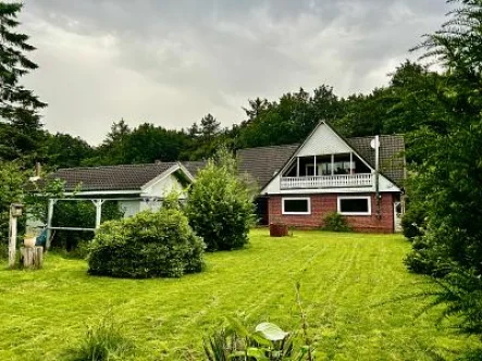  - Haus kaufen in Süderlügum - TRAUMHAFTES WOHNPARADIES IN WALDRANDLAGE