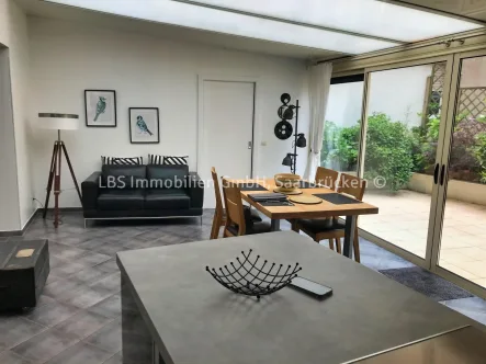 offene Küche mit Zugang Patio - Wohnung kaufen in Sarreguemines - Schönes Apartment in zentraler Lage am Parc