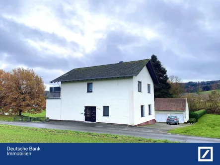 Hausansicht - Haus kaufen in Preußisch Oldendorf - Generationenwohnen mitten im Grünen!