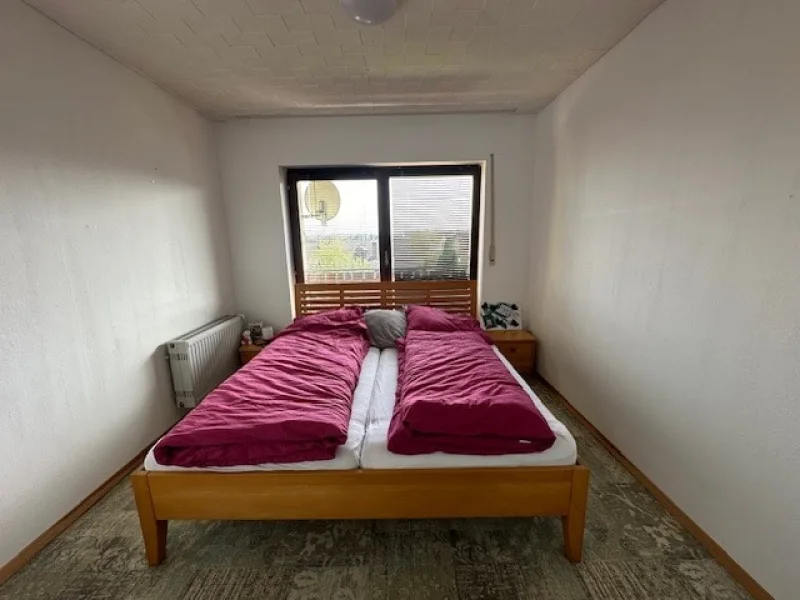 Kleines Schlafzimmer im EG