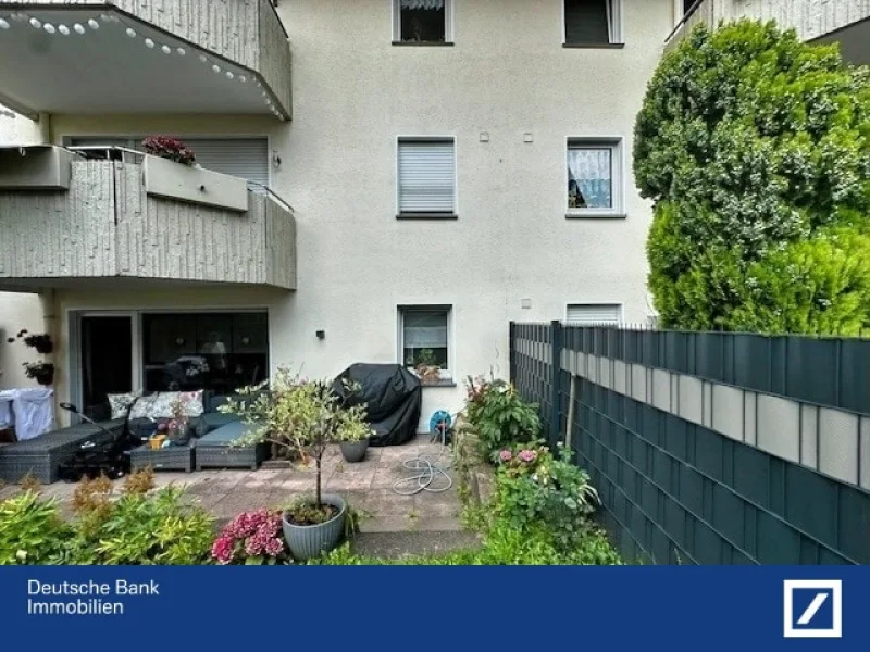 Hinteransicht  - Wohnung kaufen in Dortmund - Familienwohnung mit Terrasse und kleinem Garten