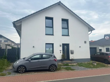 Front - Haus kaufen in Hürtgenwald - Ein familienfreundliches Einfamilienhaus mit schönem Garten wartet auf Sie!