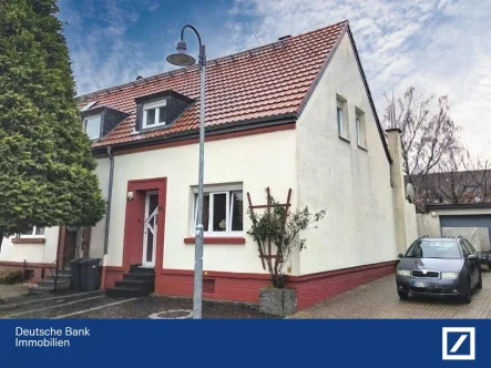 Frontansicht (1) - Haus kaufen in Alsdorf - modernisierte Doppelhaushälfte in familienfreundlicher Lage