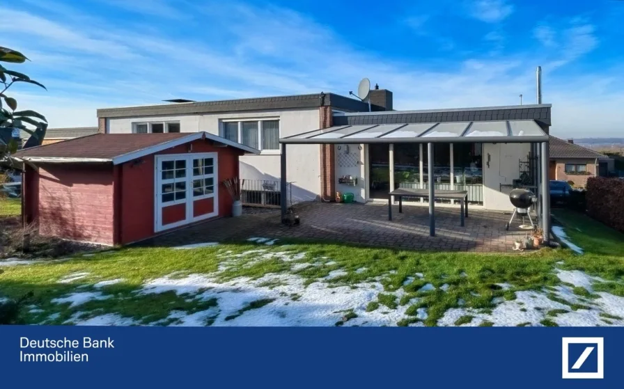 Gartenansicht - Haus kaufen in Stolberg - Architektonisch beeindruckender Flachdachbau in Stolberg Donnerberg