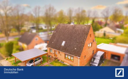 Titelbild - Haus kaufen in Rendsburg - Vielseitiges Potential: Familienoase südlich des Nord-Ostsee-Kanals