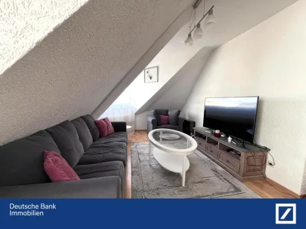 Wohnzimmer - Wohnung kaufen in Ludwigshafen - Moderne Stadtwohnung mit Flair: Dachgeschosswohnung inklusive Aufzug in Ludwigshafen!