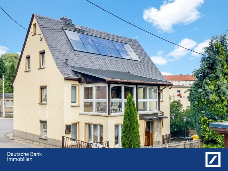 Hausansicht Wintergarten - Haus kaufen in Grünhainichen - "Großzügiges Einfamilienhaus mit Wintergarten und umweltfreundlichen Extras"