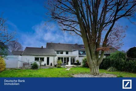 Rückansicht - Haus kaufen in Willich - Außergewöhnliches Familienhaus mit traumhaftem Garten und barrierefreiem Erdgeschoss!