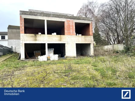 Frontansicht - Grundstück kaufen in Dortmund - Zwei-Familienhaus im Rohbau in Dortmund-Wellinghofen – Mit Garten und großer Dachterrasse!