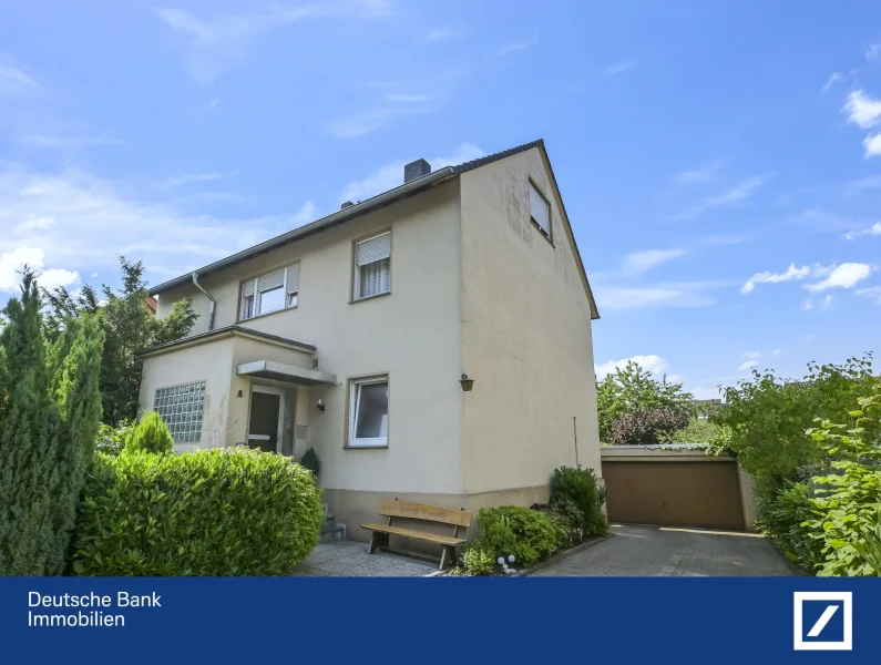 Außenansicht - Wohnung kaufen in Bielefeld - Tolle Erdgeschosswohnung mit eigener Terrasse und Gartenanteil!