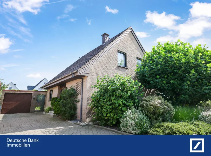 Außenansicht - Haus kaufen in Osnabrück - Tolles Einfamilienhaus in Sackgassenlage von Osnabrück-Hellern!