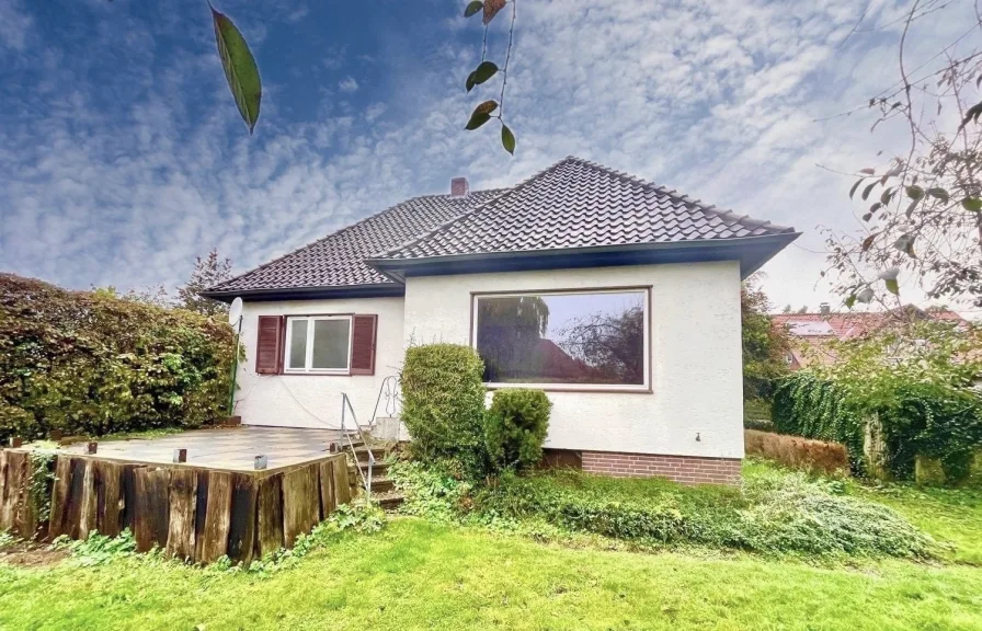 Außenansicht - Haus kaufen in Bröckel - Sofort verfügbares Einfamilienhaus mit viel Potential und schönem Garten! 