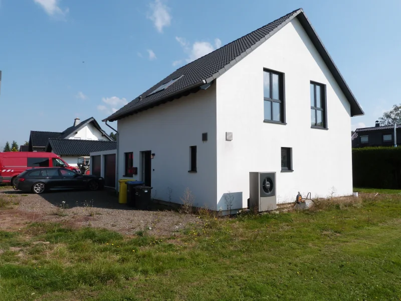 Haus mit Doppelgarage - Haus kaufen in Wiesbaum - Einfamilienhaus in Wiesbaum