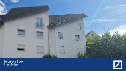 Frontansicht - Wohnung kaufen in Döttesfeld - Willkommen in der charmanten Eigentumswohnung im Erholungsort Döttesfeld im Herzen des Westerwaldes!