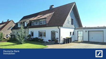 Haus von vorne - Haus kaufen in Rheinberg - Top Angebot!!! Gepflegte Doppelhaushälfte mit großem Garten in guter Lage von Rheinberg-Millingen!