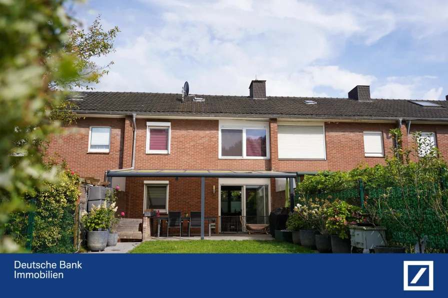 Ansicht Haus  - Haus kaufen in Wesel - Charmantes Reihenmittelhaus in Wesel-Flüren mit Garten und Garage