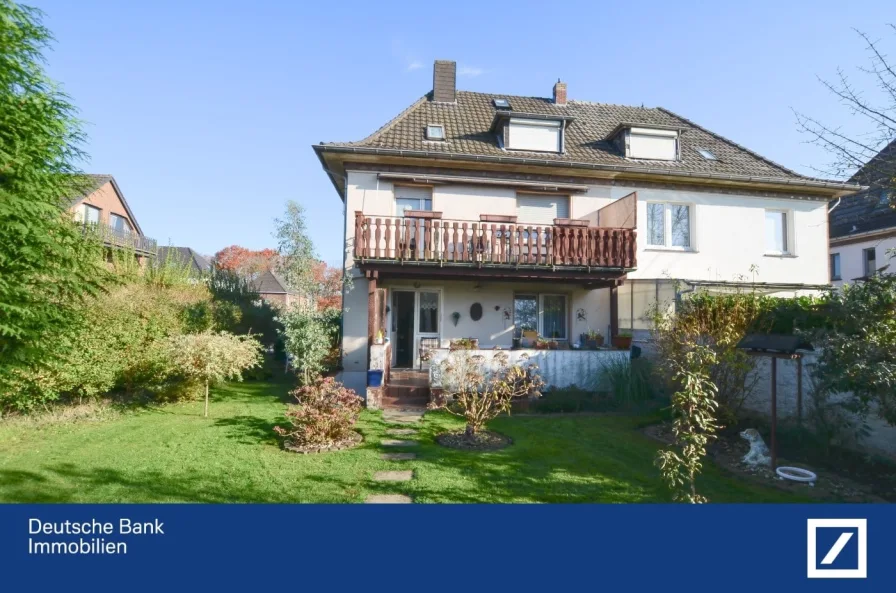 Gartenansicht - Haus kaufen in Kleve - Charmante Doppelhaushälfte als Zweifamilien-Haus in der Klever-Oberstadt