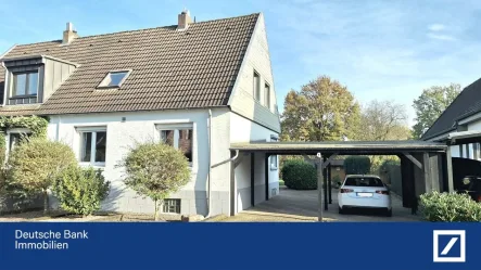 Haus von vorne - Haus kaufen in Emmerich - Gepflegte Doppelhaushälfte in ruhiger und zentraler Lage von Emmerich sucht neue Bewohner!