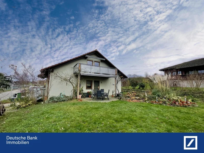 Außenansicht - Haus kaufen in Friesenheim - Familienfreundliches Einfamilienhaus mit großem Garten und vielseitigem Raumangebot!