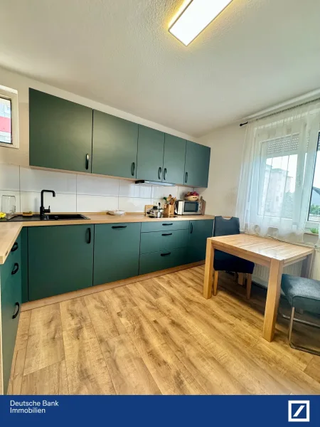 Küche - Wohnung kaufen in Ludwigshafen - Charmante 3-Zimmer-Wohnung mit Balkon und Garage in Friesenheim