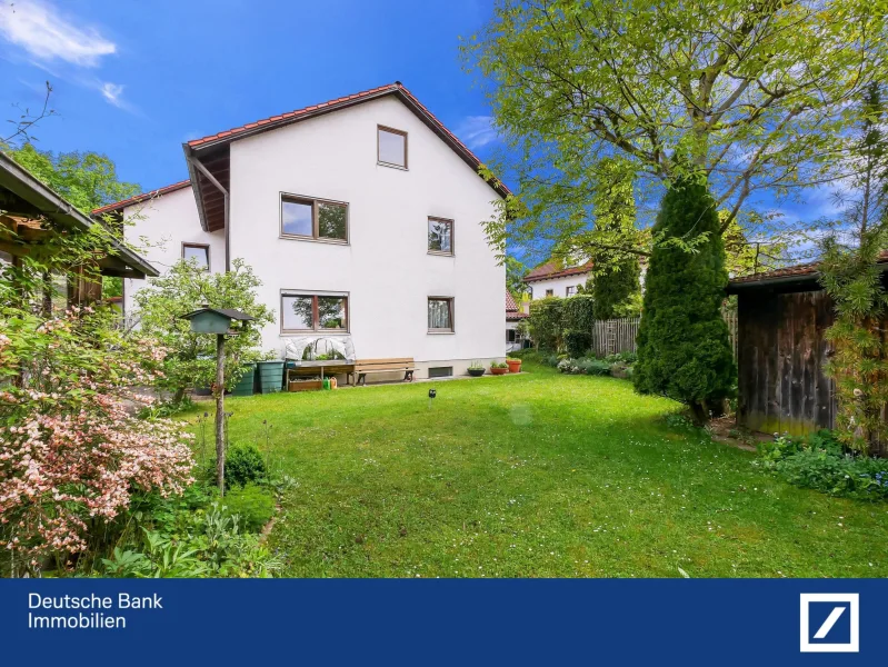 Süd Ansicht - Haus kaufen in Grasbrunn - Mehrgenerationenhaus mit großem Garten