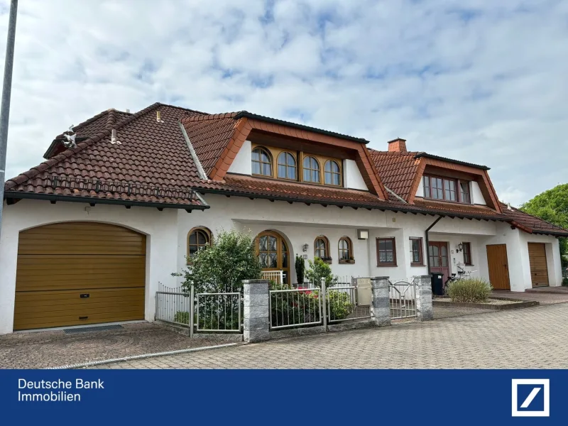 Außenansicht - Haus kaufen in Rodgau - Familientraum mit 210 m² Wohnfläche in Rodgau-Jügesheim 